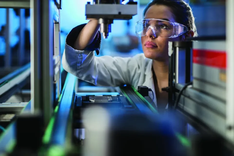A woman working in a lab