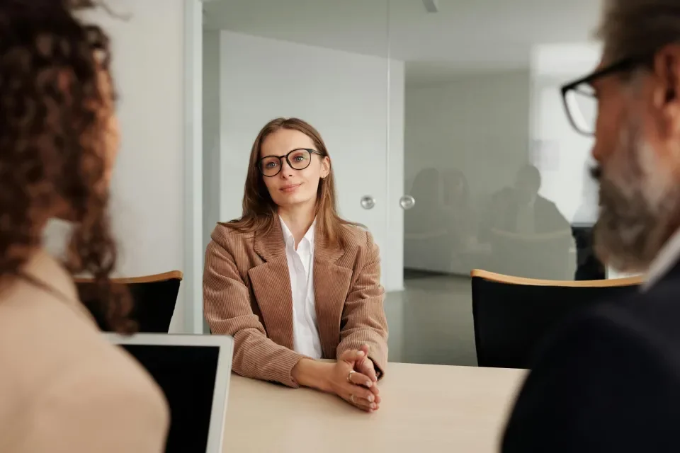 Interview with woman and two interviewees