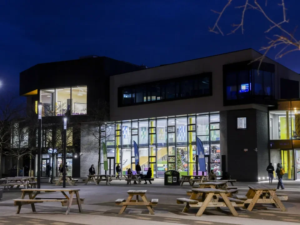 Shows the U Building on Glasnevin campus at night 