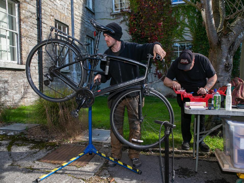 Shows the bike servicing clinic on DCU's Glasnevin campus