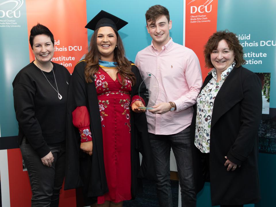 Aideen Kelly with John's son Matt and sisters Maria and Siobhán