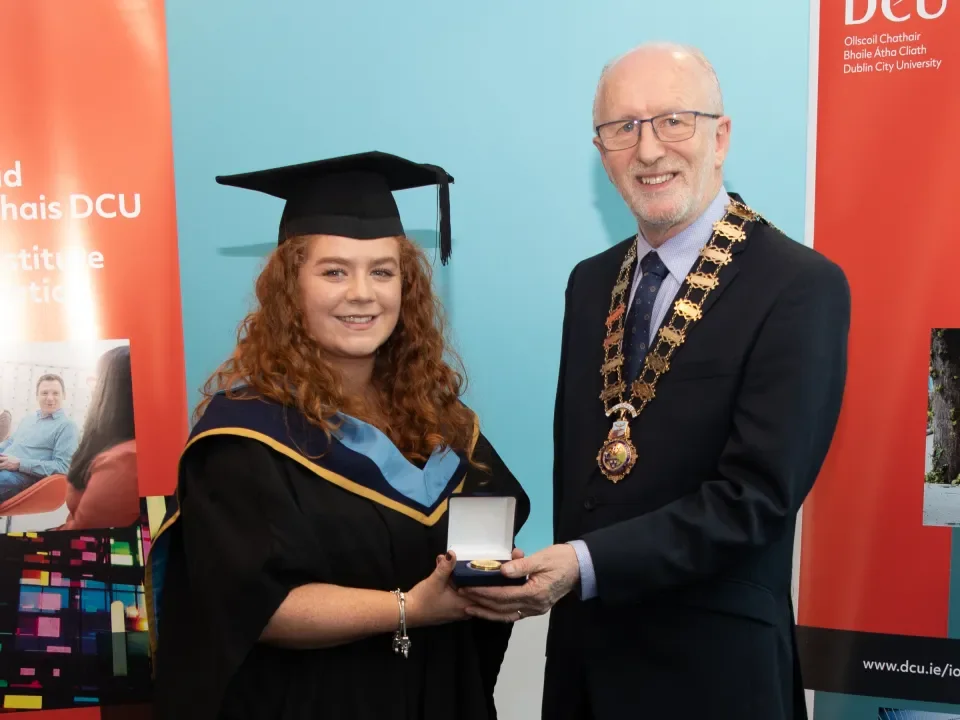Georgia Goodall with John Driscoll, Vice President INTO