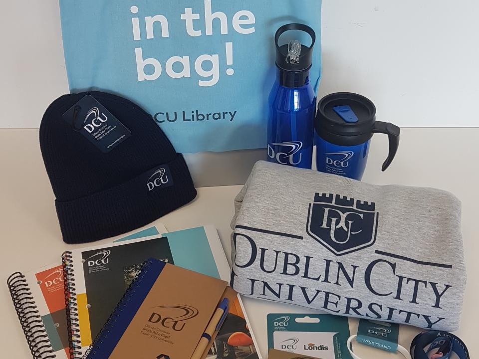 Library tote bag with all the runners-up prizes around it