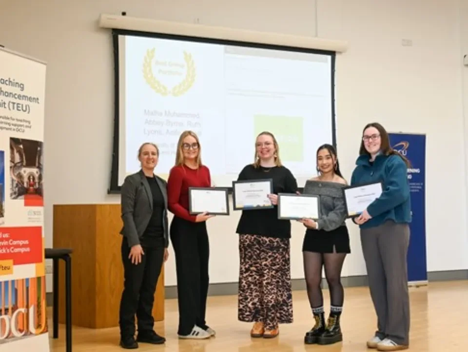 Group award winners accepting their award from Dr. Monica Ward, Dean of Teaching and Learning