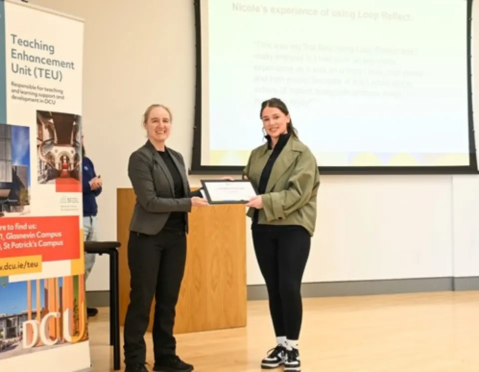 Nicola Brooks accepting her award from Dr. Monica Ward, Dean of Teaching and Learning