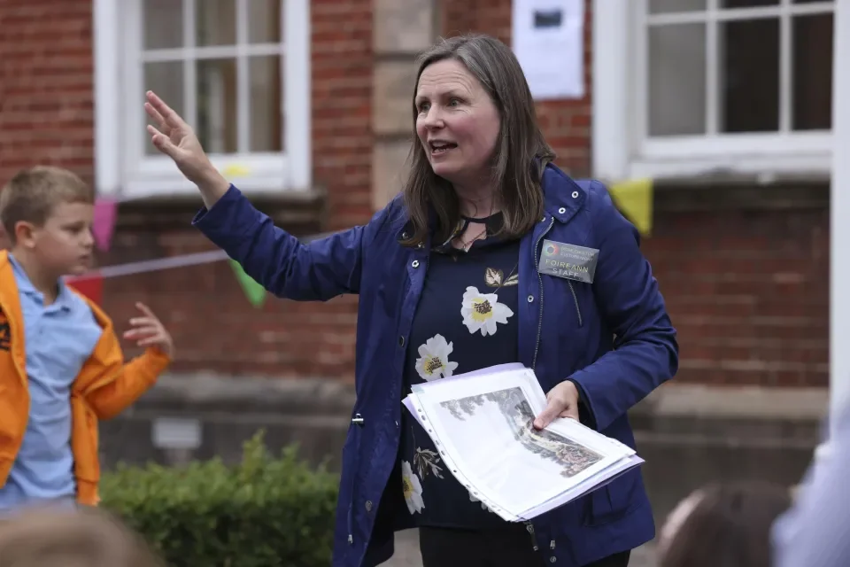 Dr Ruth McManus speaks to an audience outside Belvedere House