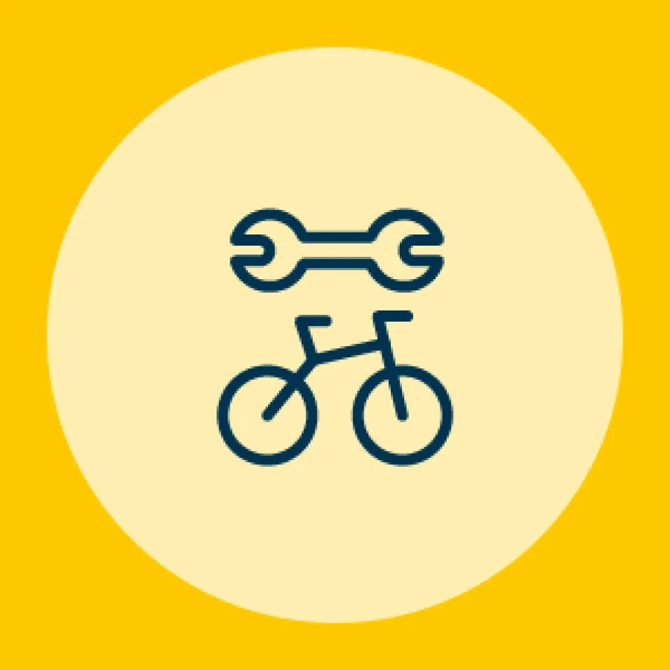 Image of a bike and a wrench