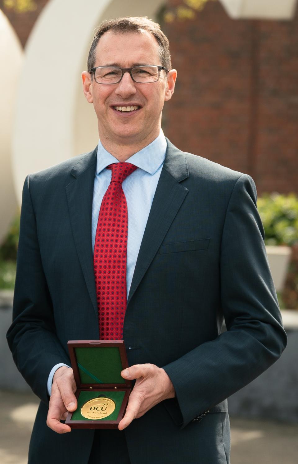 Prof Dunne