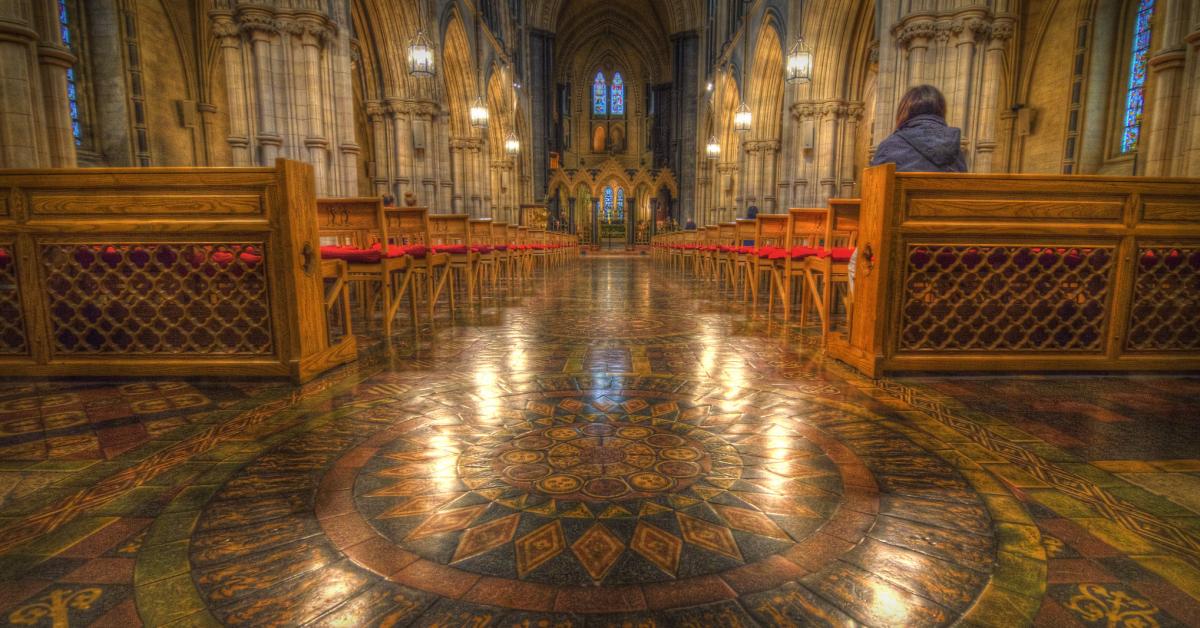 Lone person in prayer at Christ Church Cathedral, Dublin