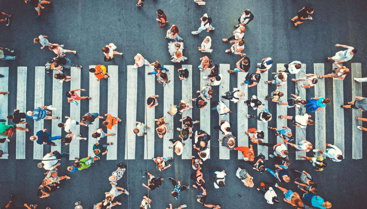 Birds eye image of a zebra crossing with people walking