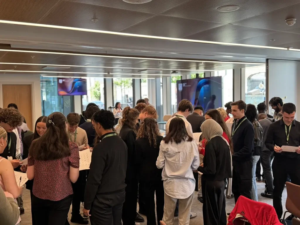 Students playing an icebreaker activity to win LinkedIn merchandise
