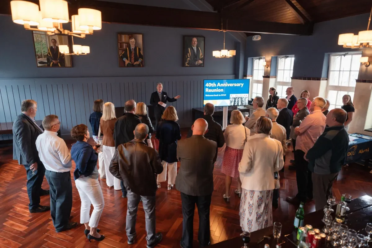 1984 alumni listen to DCU president speak