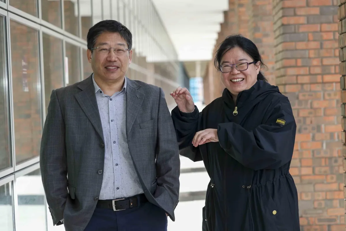 Shows Dr Jaifu Wang and Dr Jianghui Meng on DCU's Glasnevin campus