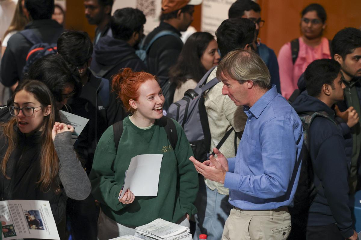 Students Smiling and Event Promotion Details