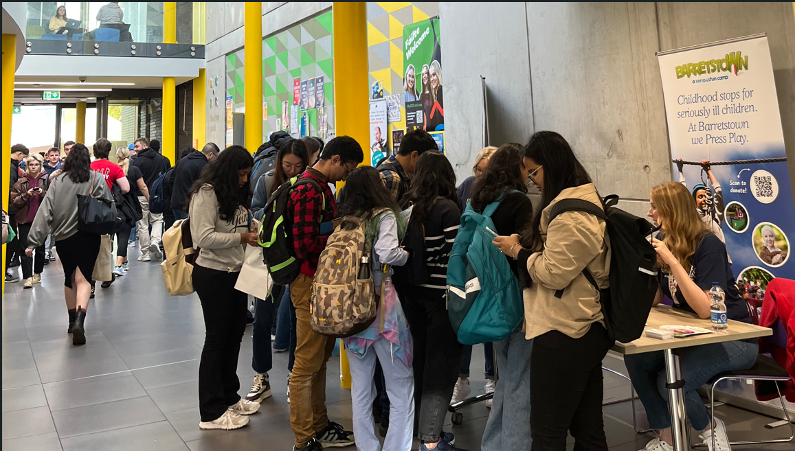 A group of people standing in a line