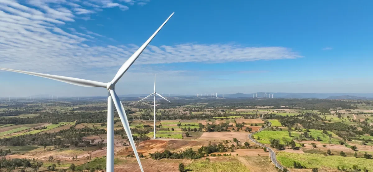Shows windmills, wind power