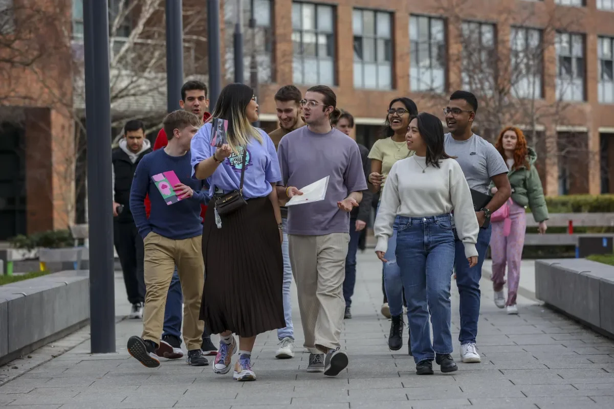 A group of students walking through campus in Glasnevin