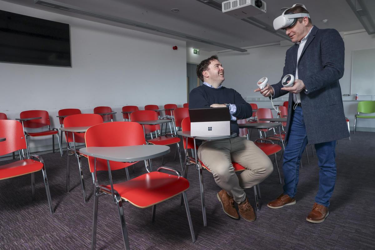 Shows Dr Peter Tiernan and Dr Alan Gorman using VR equipment