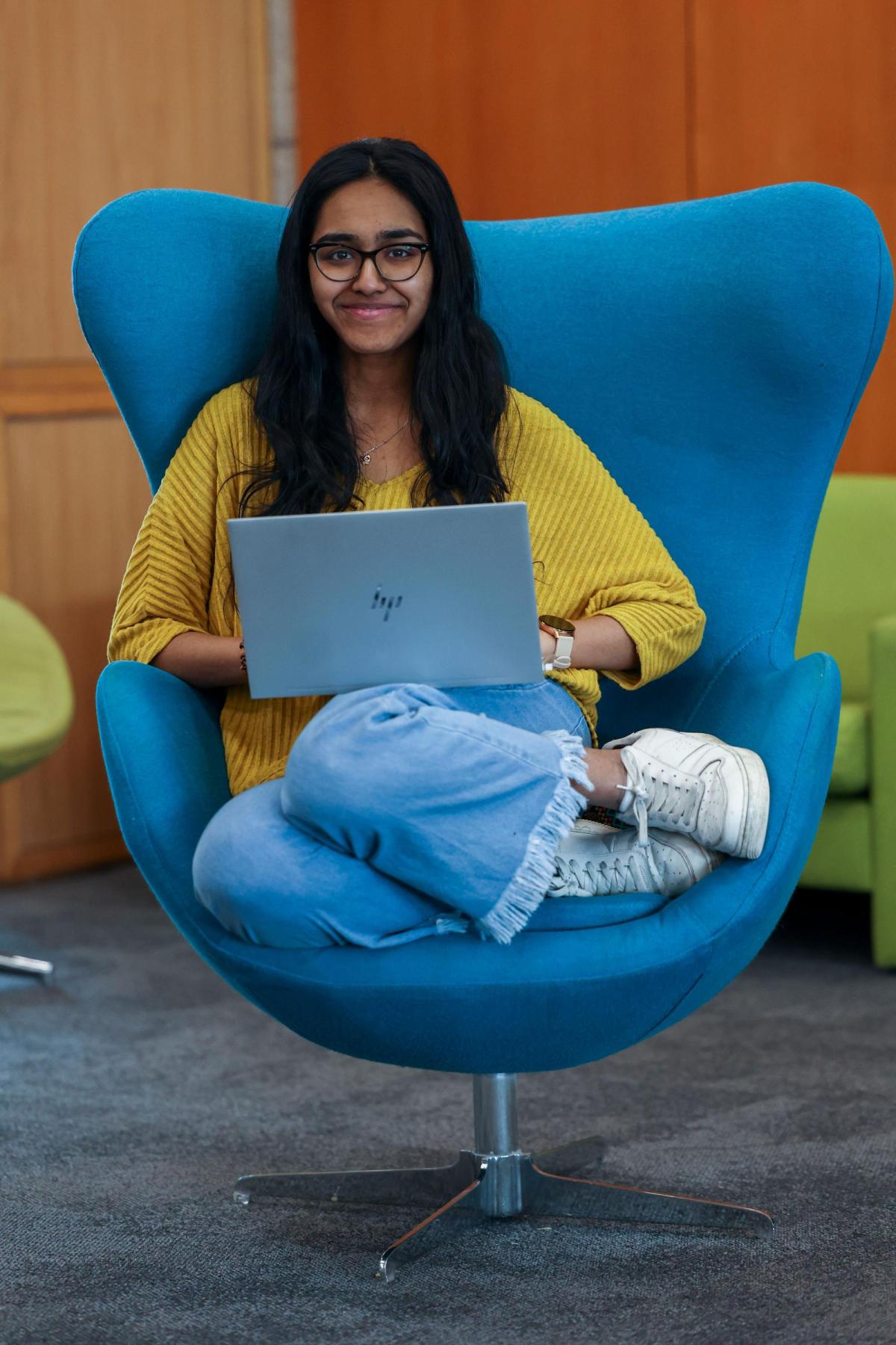 Student works on a laptop