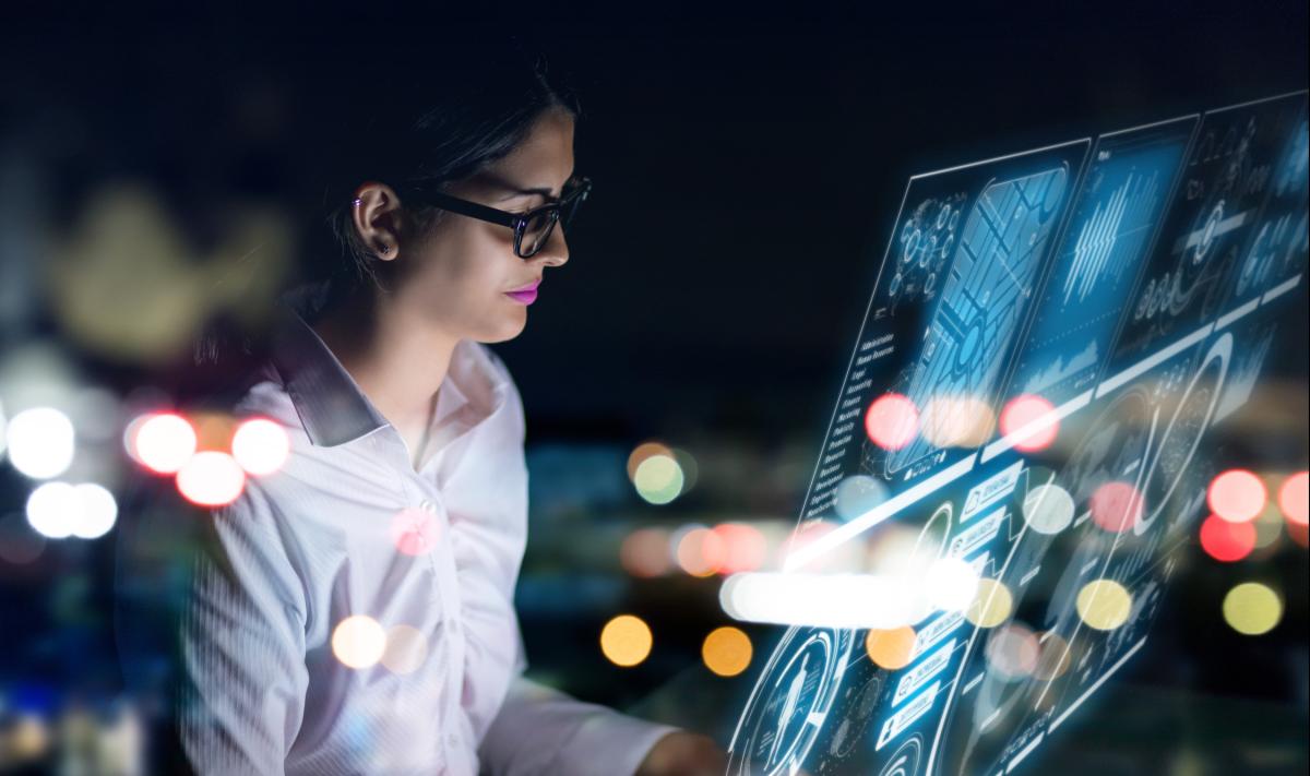 This image shows a woman working on a screen