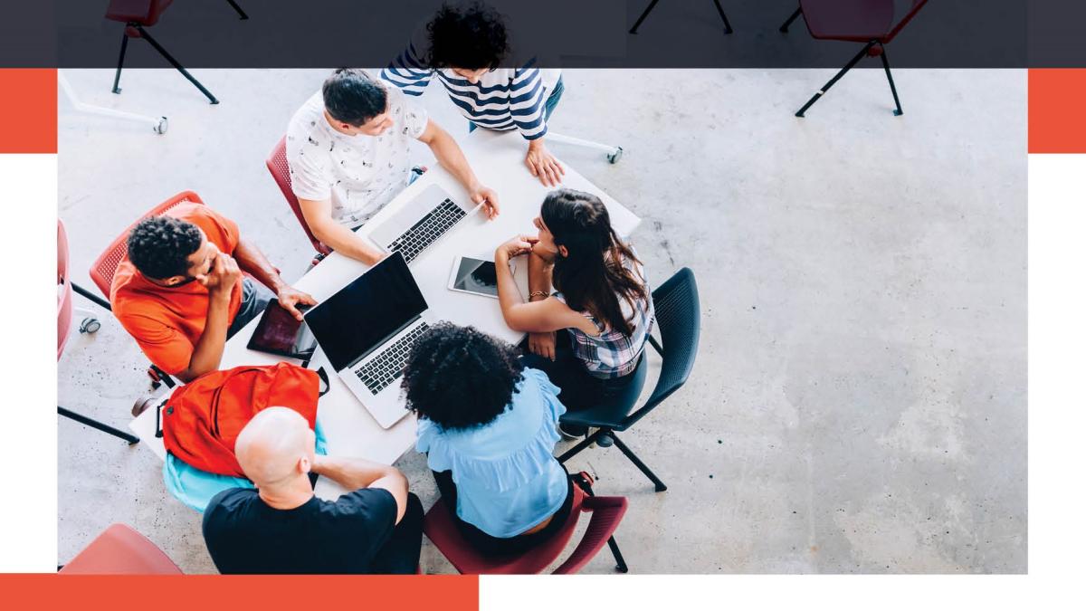 People sitting at a table together working