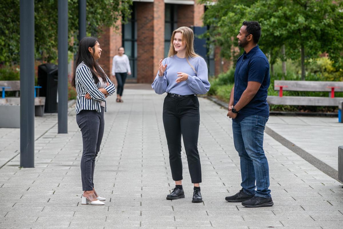 Image of students standing at the plaza on DCU Glasnevin