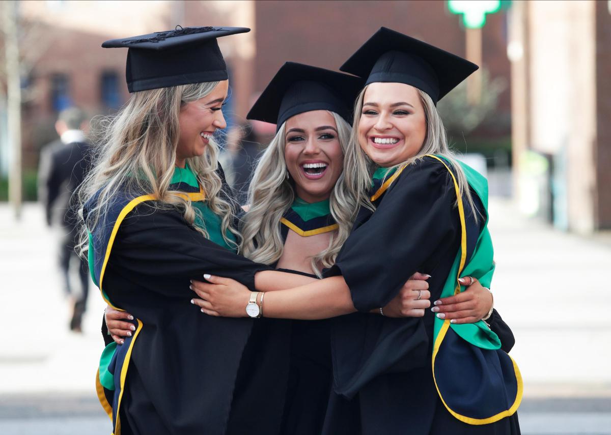 Image of DCU graduates hugging