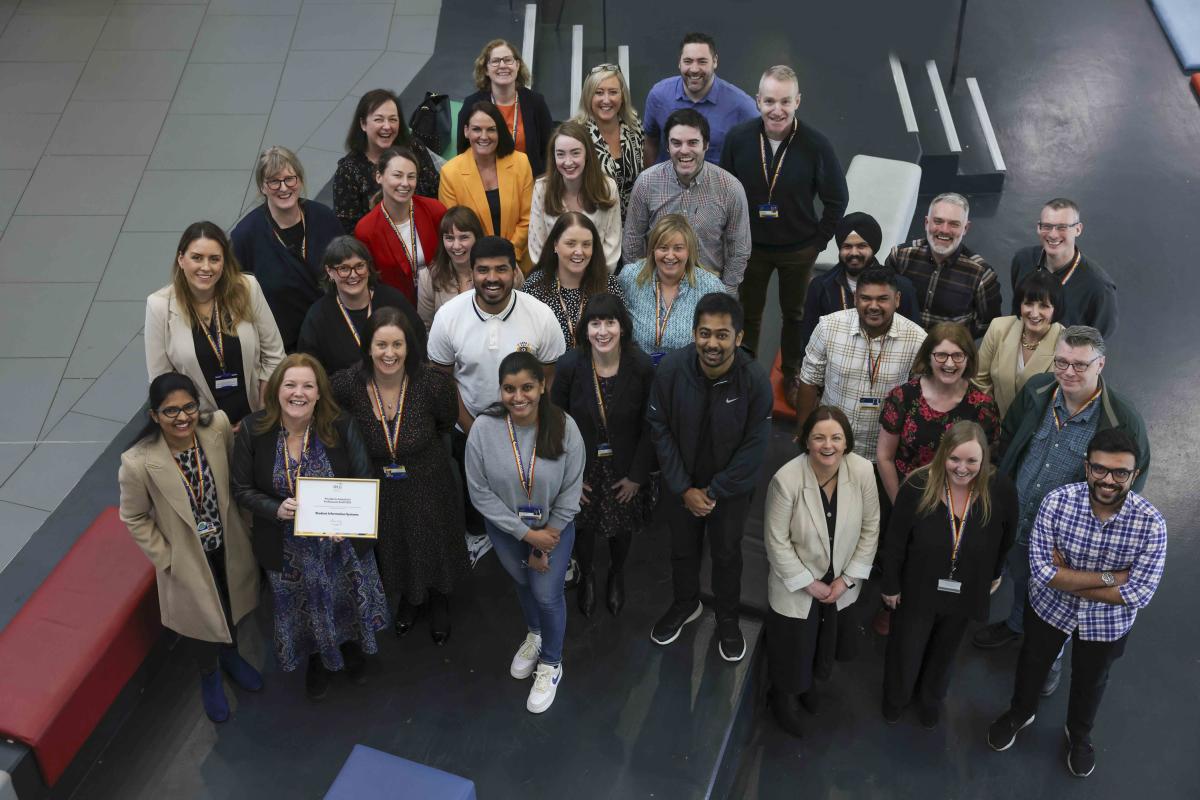 SIS team receiving their President's Award from Prof Dáire Keogh