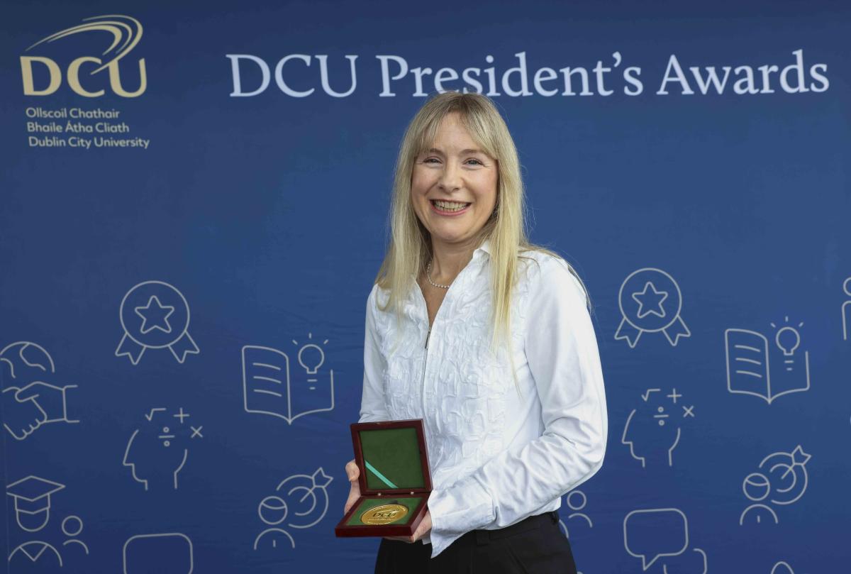 Julie Bertz with her President's Award.