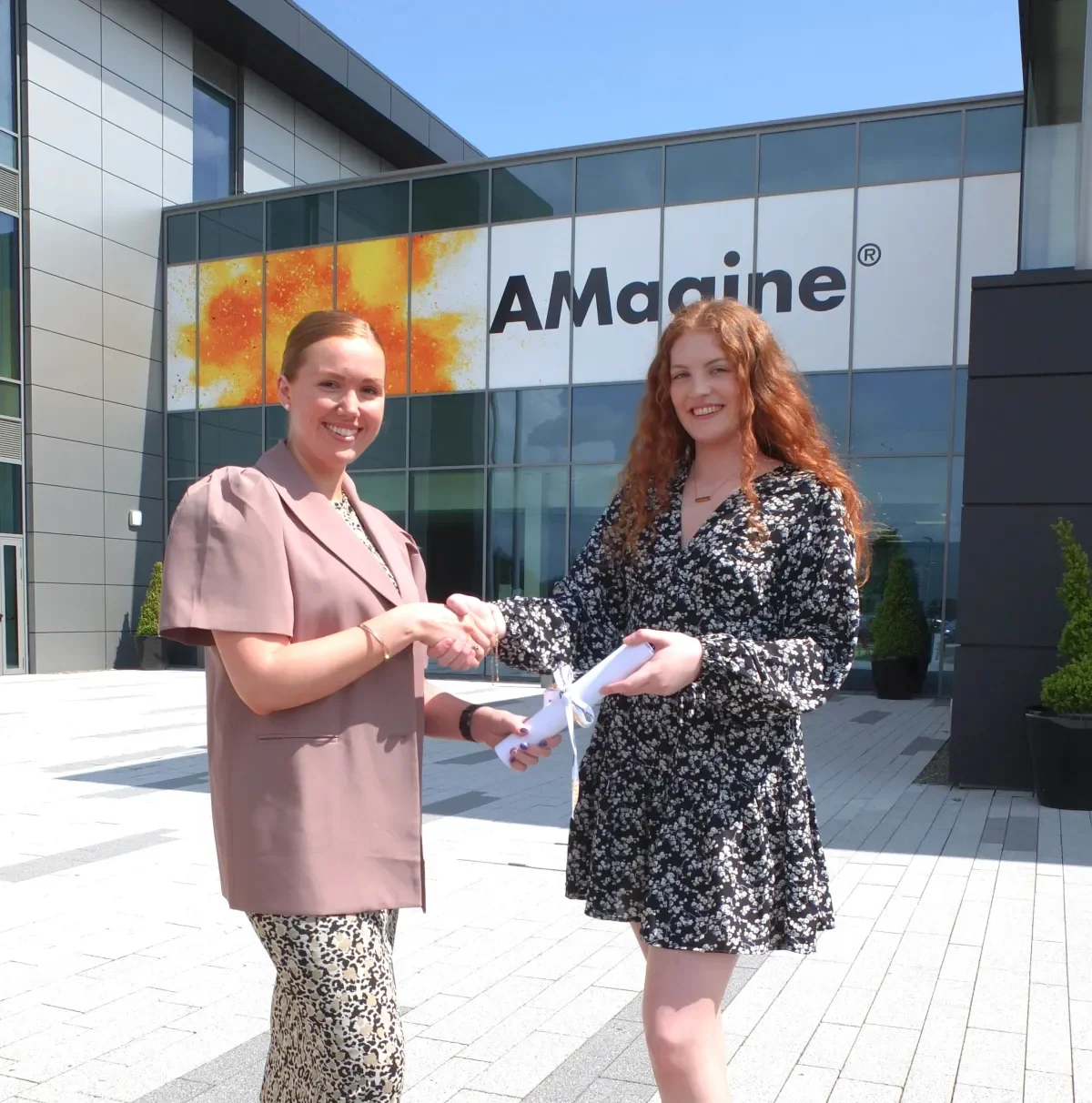 This image shows DCU student receiving Stryker WISE Female Engineering Excellence Prize