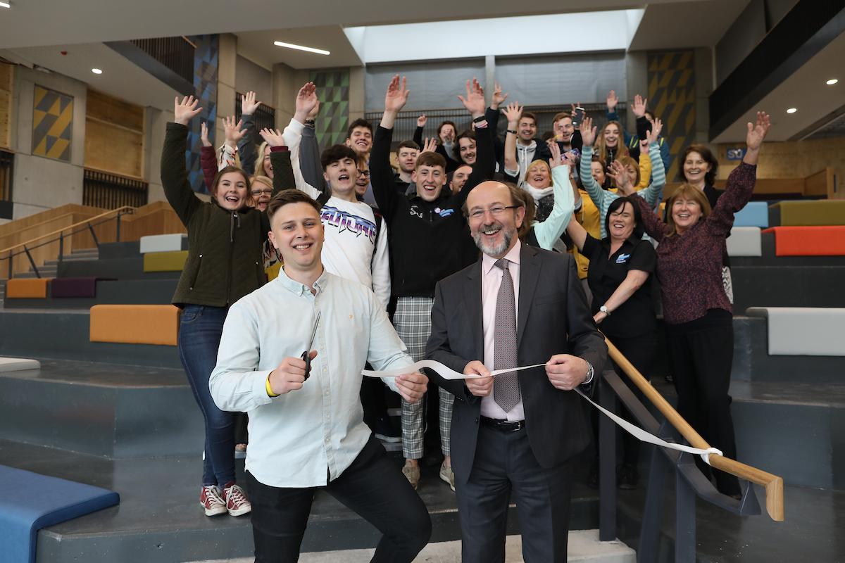 Niall Behan, Student's Union President and Prof. Brian MacCraith, President of Dublin City University surrounded by students and