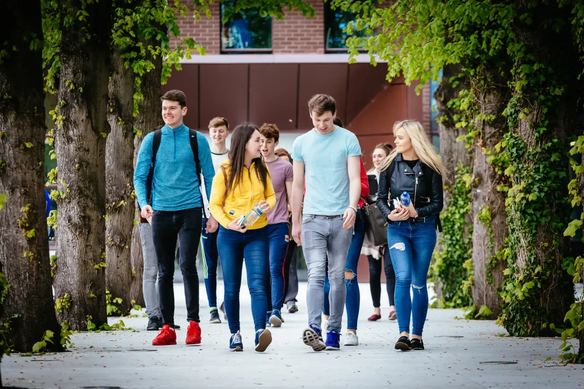 Students walking & chatting outside St Pats College DCU