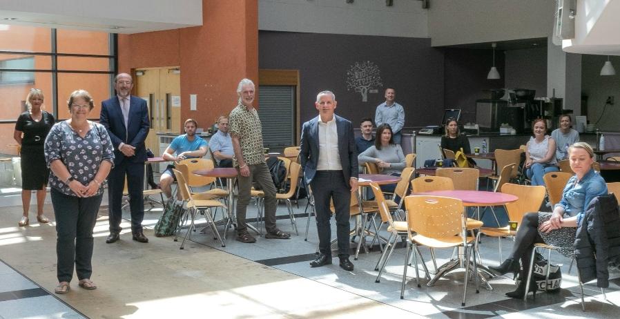 Volunteers from the School of Biotechnology and DCU with HSE Chief Executive Officer Paul Reid