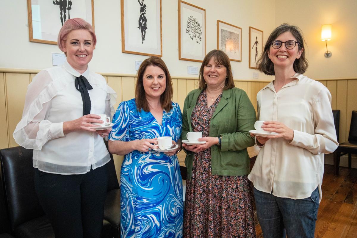 Shows DCU staff at an event celebrating Aurora course completion