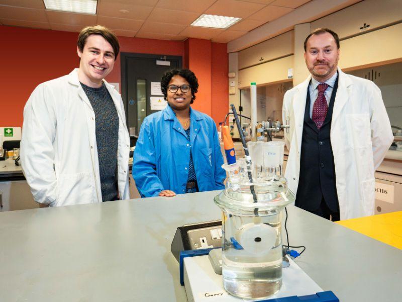 Shows Dr Cian Hughes, Dr Sithara Sreenilayam and Prof Dermot Brabazon in the lab