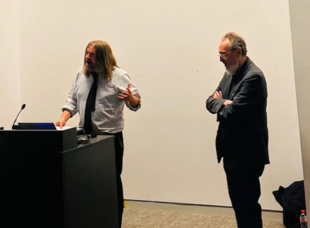 Prof Paul Downes and Prof Michael Apple at a symposium
