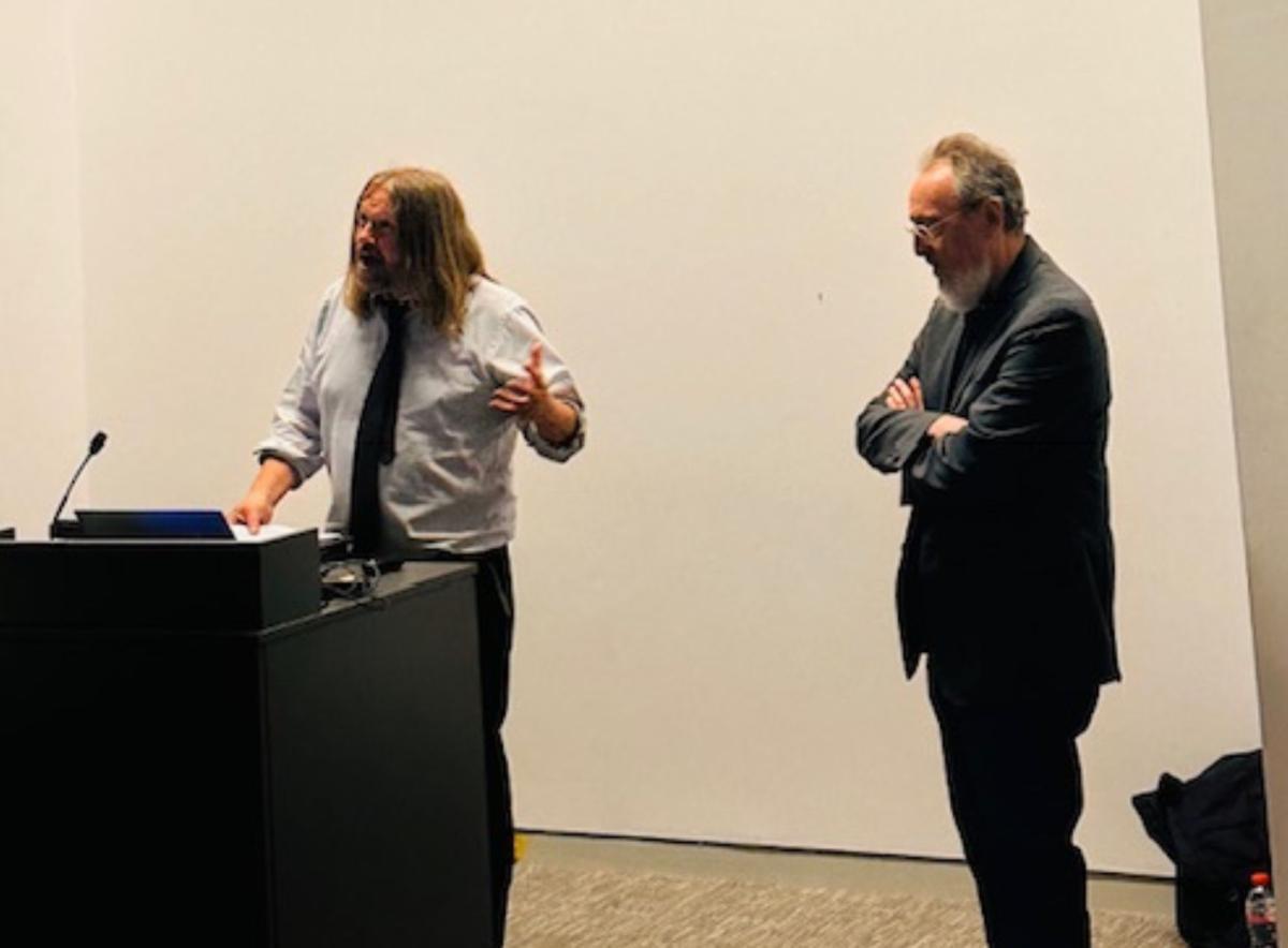 Prof Paul Downes and Prof Michael Apple at a symposium