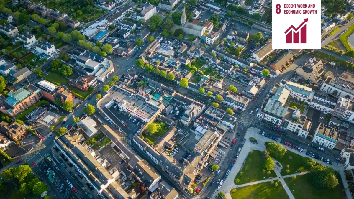 Shows aerial view of urban area