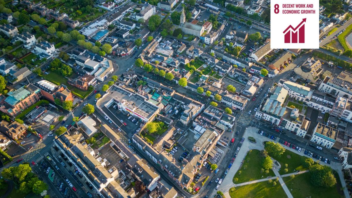 Shows aerial view of urban area