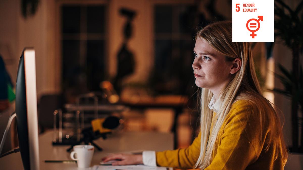 Shows woman reading from computer screen