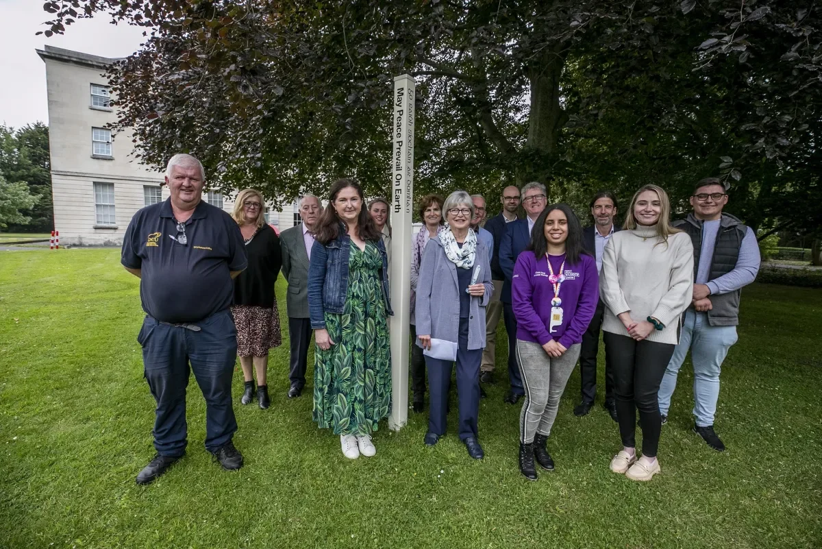 Shows Rotary Peace Pole on DCU's All Hallows Campus