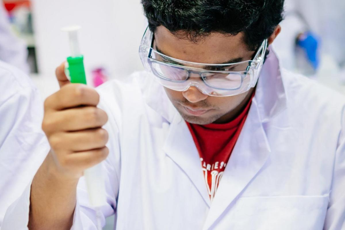 One student working in a lab