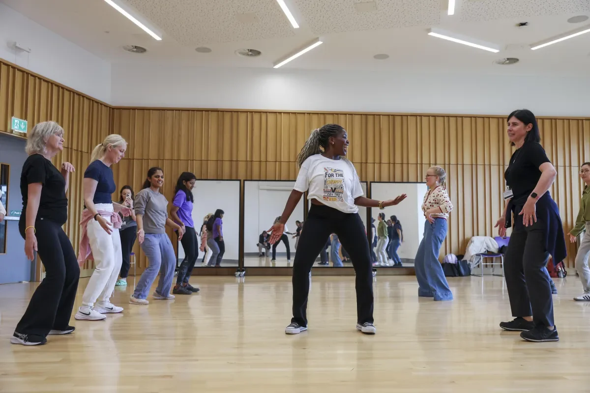 Staff and students of DCU taking part in the Bridging the Gap dancing class for Black History Month