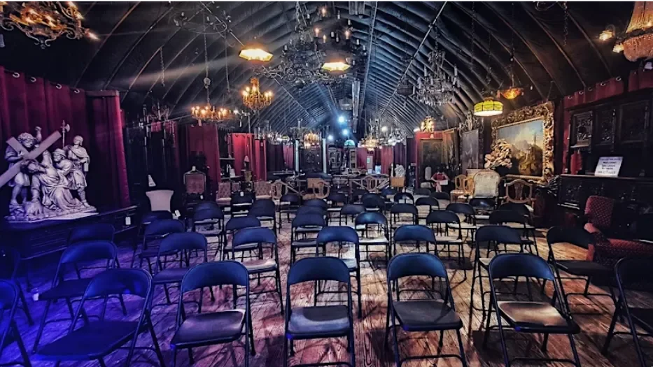 Seats laid out in a gothic style venue 