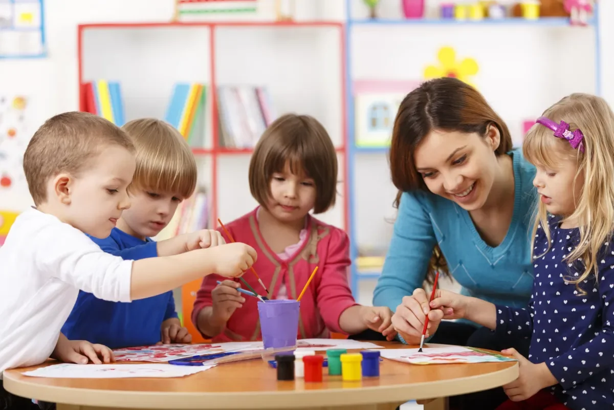 School Children Learning at a Table