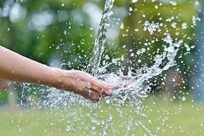 DCU Water Institute - hand under stream of water