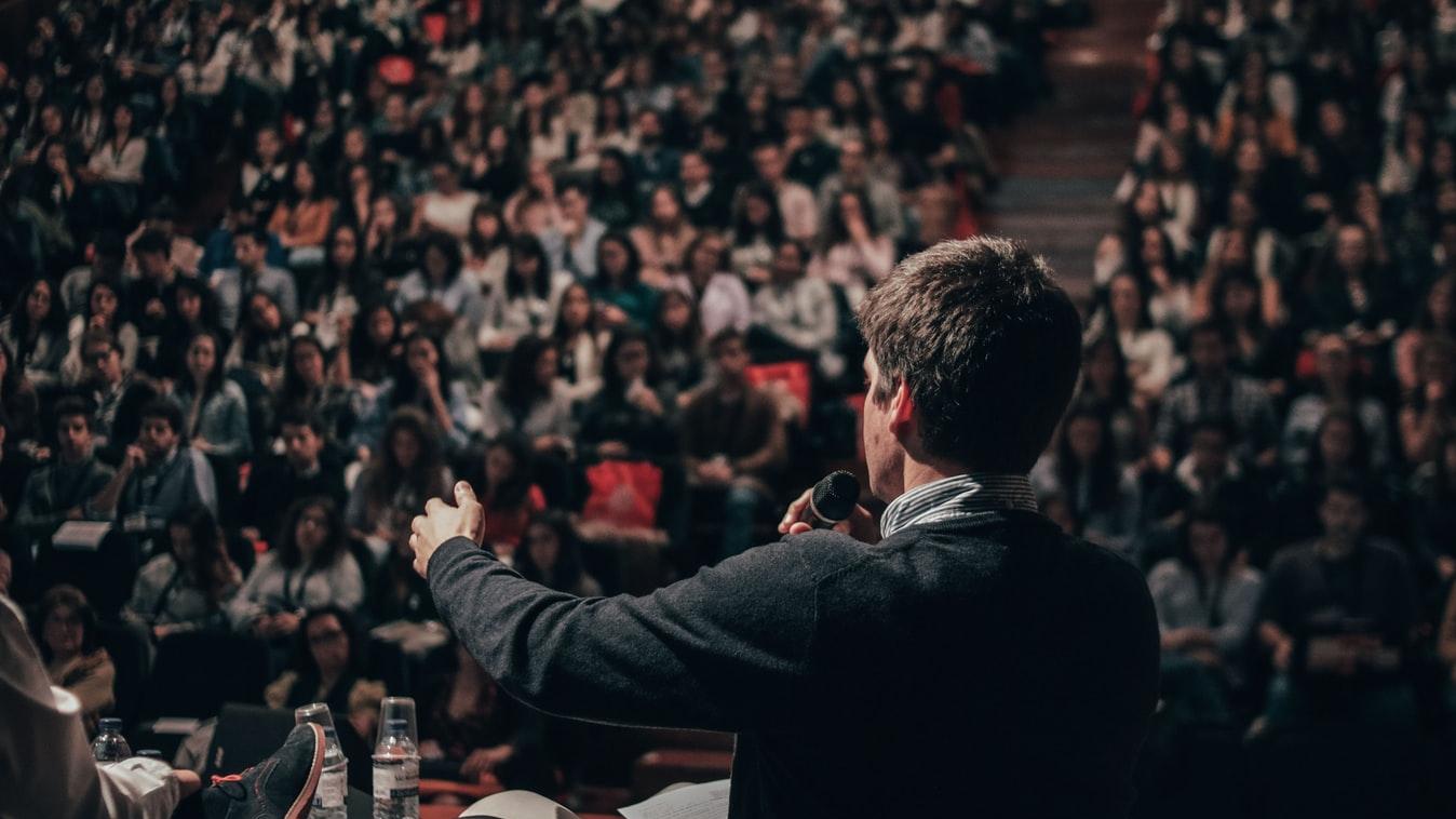 Lecturer in a large theatre