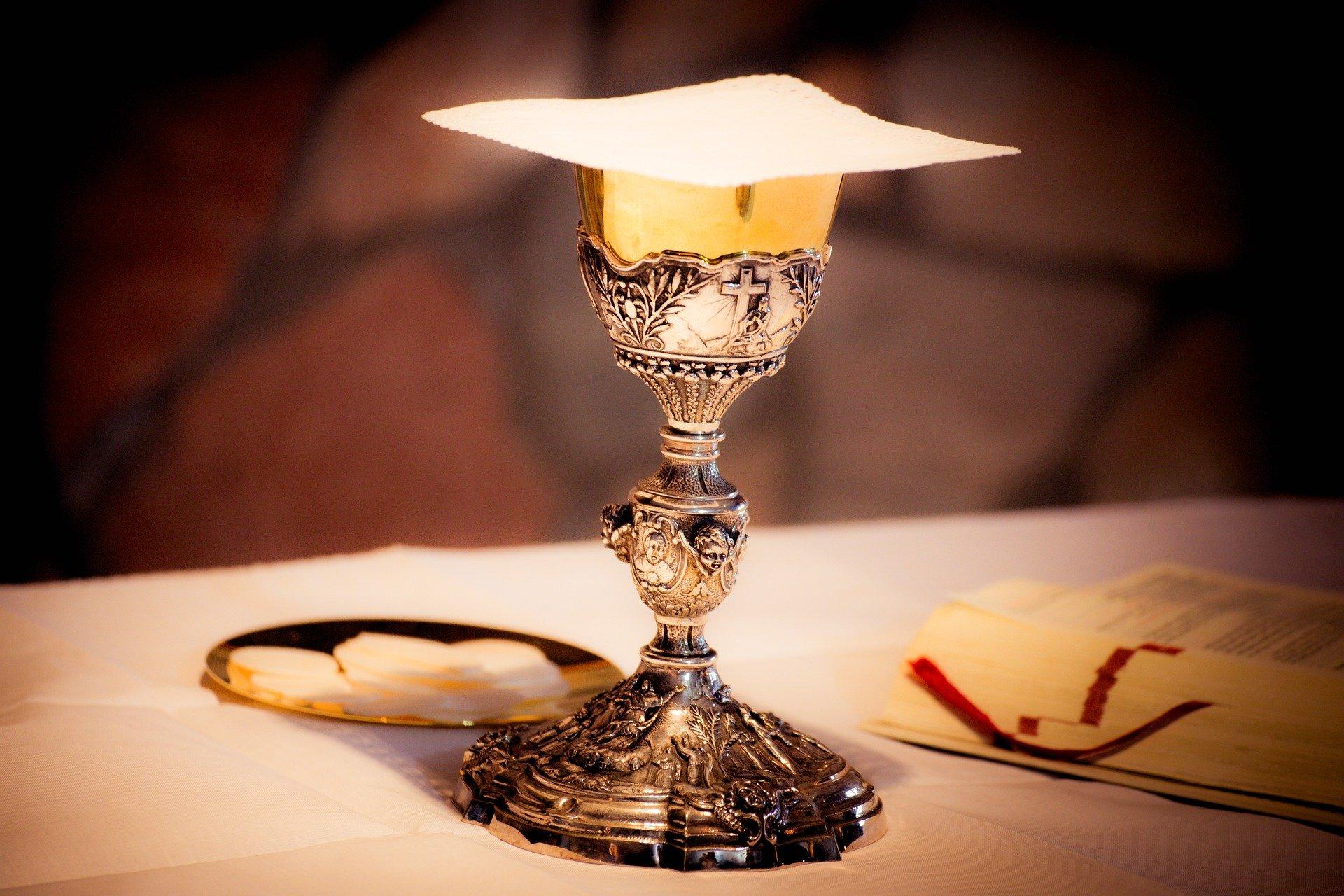 Chalice and Host in Roman Catholic Mass service