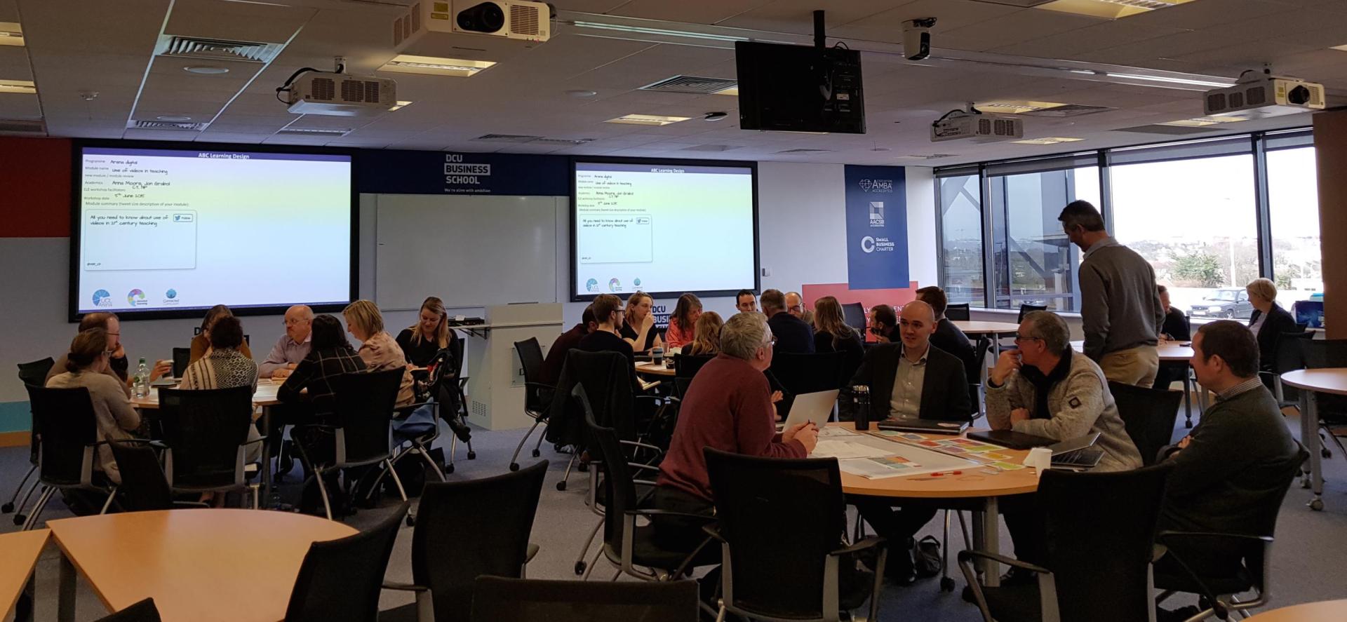 Large Group working on Tweet