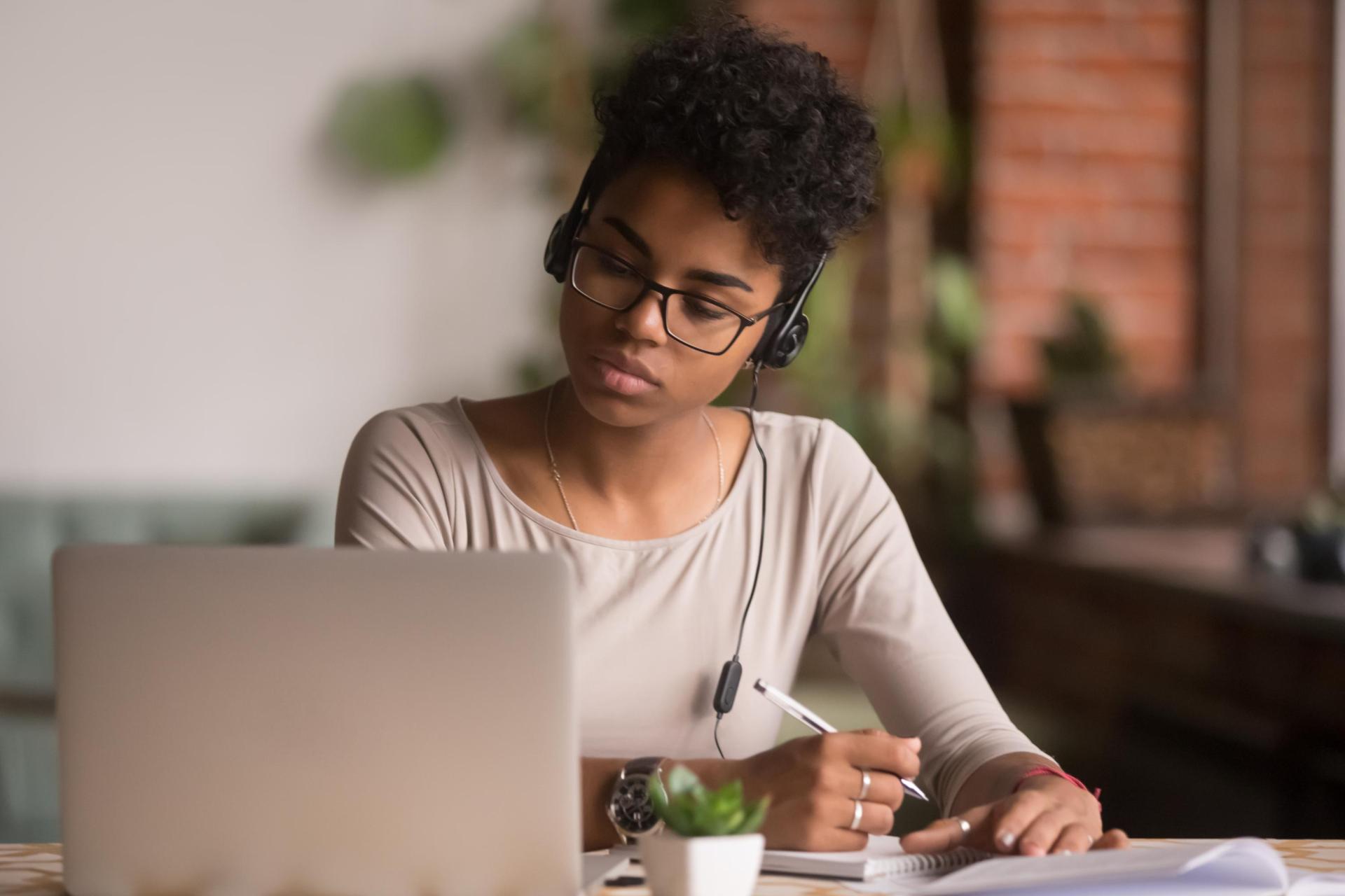 female student working at computer